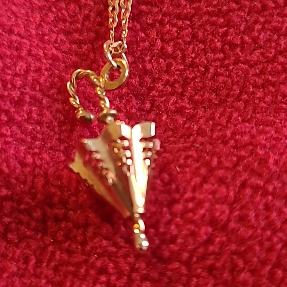 18k solid yellow gold necklace with umbrella pendant.